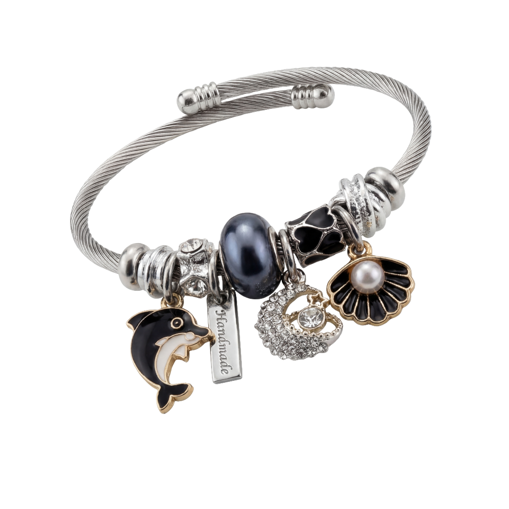 Silver bracelet with various charms on a white background