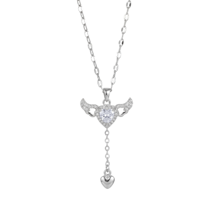 Silver necklace with a heart-shaped pendant on a white background