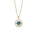 Gold necklace with a blue gemstone pendant on a white background