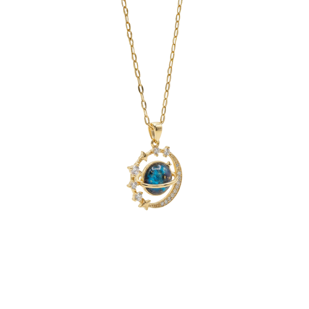 Gold necklace with a blue gemstone pendant on a white background