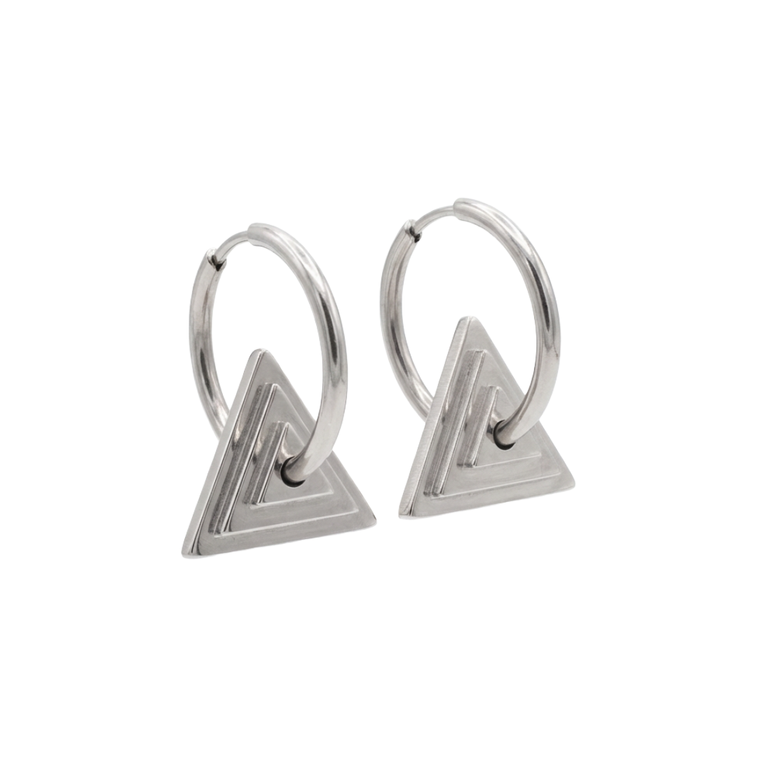 Pair of silver hoop earrings with triangular designs on a white background