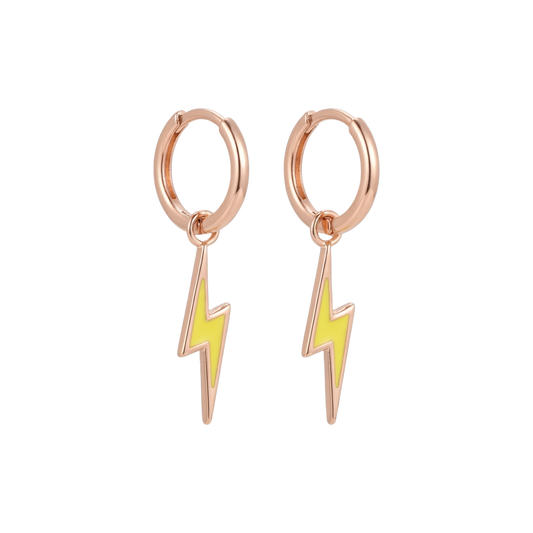 Rose gold hoop earrings with yellow lightning bolt charms on a white background