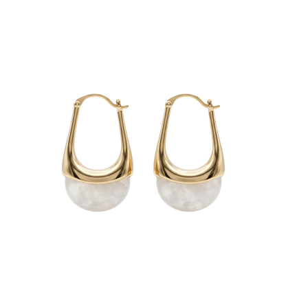 Gold hoop earrings with white stone beads on a white background