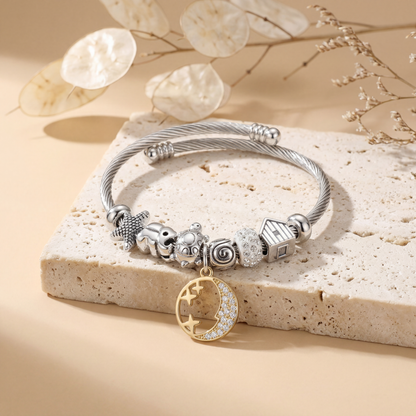Pulsera de cable de acero inoxidable con dije de luna y estrellas